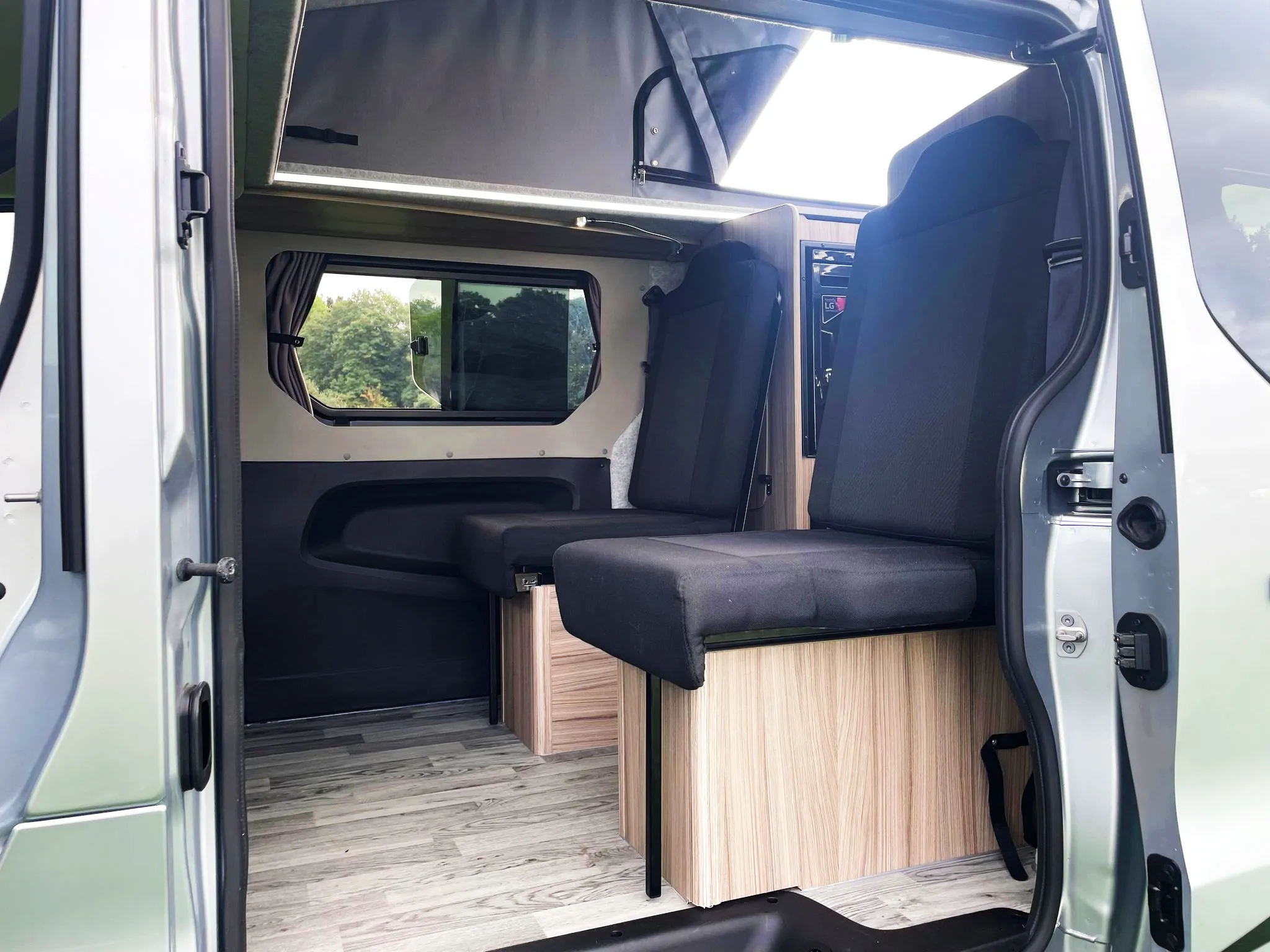 The Witley Camper Van Conversion for the Vauxhall Vivaro, Renault Trafic, Nissan NV300 Fiat Talento with up to  six 6 traveling seat camper