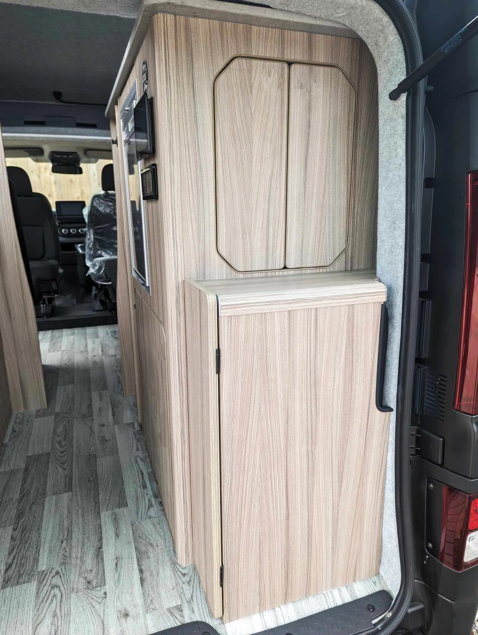 The Witley Camper Van Conversion for the Vauxhall Vivaro, Renault Trafic, Nissan NV300 Fiat Talento with up to  six 6 traveling seat camper