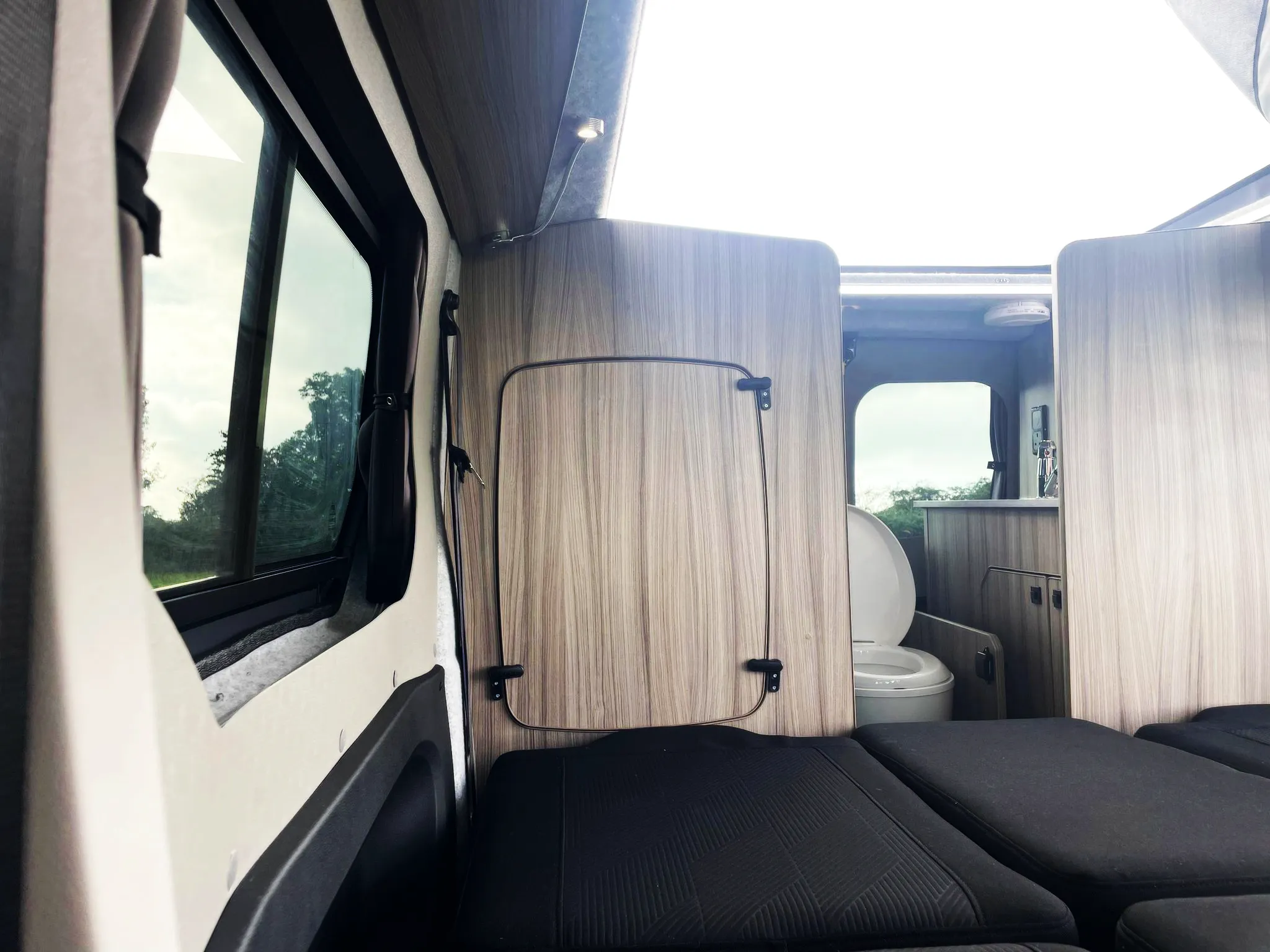 The Witley Camper Van Conversion for the Vauxhall Vivaro, Renault Trafic, Nissan NV300 Fiat Talento with up to  six 6 traveling seat camper